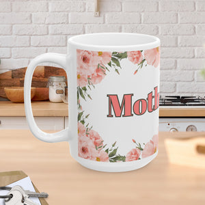 This 15 ounce mug has the word Mother and is adorned with beautiful words that describe your mom's personality, such as optimistic, tender, heroine, encourager, and reliable. It also has flowers in pastel pinks and greens around the wording on mug.