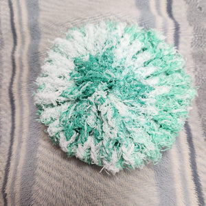 These are 100% Cotton Face Cleaning Pads in teal and white