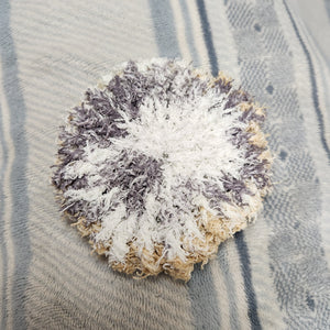 These are 100% Cotton Face Cleaning Pads in variegated grey, white, and  tan