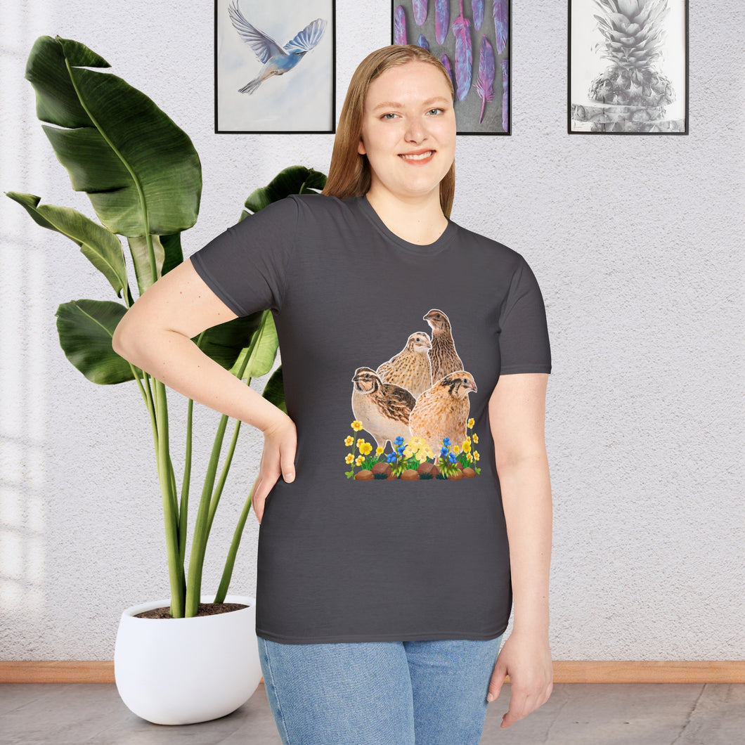 A girl wearing a Charcoal T-shirt. This is a unique and stylish piece of clothing that features a beautifully detailed illustration of a Coturnix Quail. The illustration is printed in a natural brown hue, giving the shirt a rustic and earthy feel with colorful flowers.