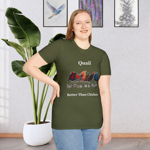 A Girl standing in a room with a plant and paintings on the wall wearing a military green t-shirt that says Quail Better Than Chicken on the front with a line of quail that look as if they are quilted in the front middle of the shirt
