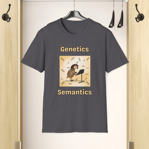 A Charcoal T-shirt hanging in a closet that says Genetics Semantics. It has a picture of a quail standing in front of a music stand with DNA strands all around it with a creamy Ombre background