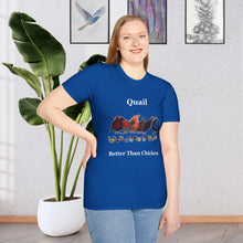 A Girl standing in a room with a plant and paintings on the wall wearing a Royal Blue t-shirt that says Quail Better Than Chicken on that look as if they are quilted in he front with a line of quail tthe front middle of the shirt