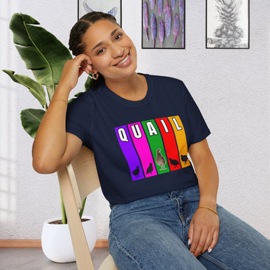 A girl seated in a chair by a plant wearing a Navy Blue T-Shirt features multi-color verticle stripes in Purple, Pink, Green, Red, and Yellow. Each vertical stripe has a letter of the word quail at the top, It has silhouettes of Coturnix Quail, along with one in full color that is standing tall in the center of the graphic.