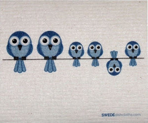 A Swedish dishcloth with Blue Owls on a wire